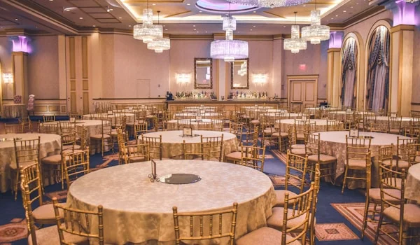 Banquet hall with round tables set for an event